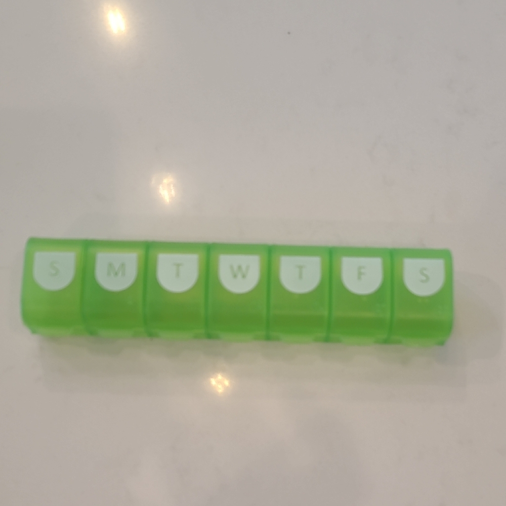 Free With Purchase Green Weekly Pill Organizer